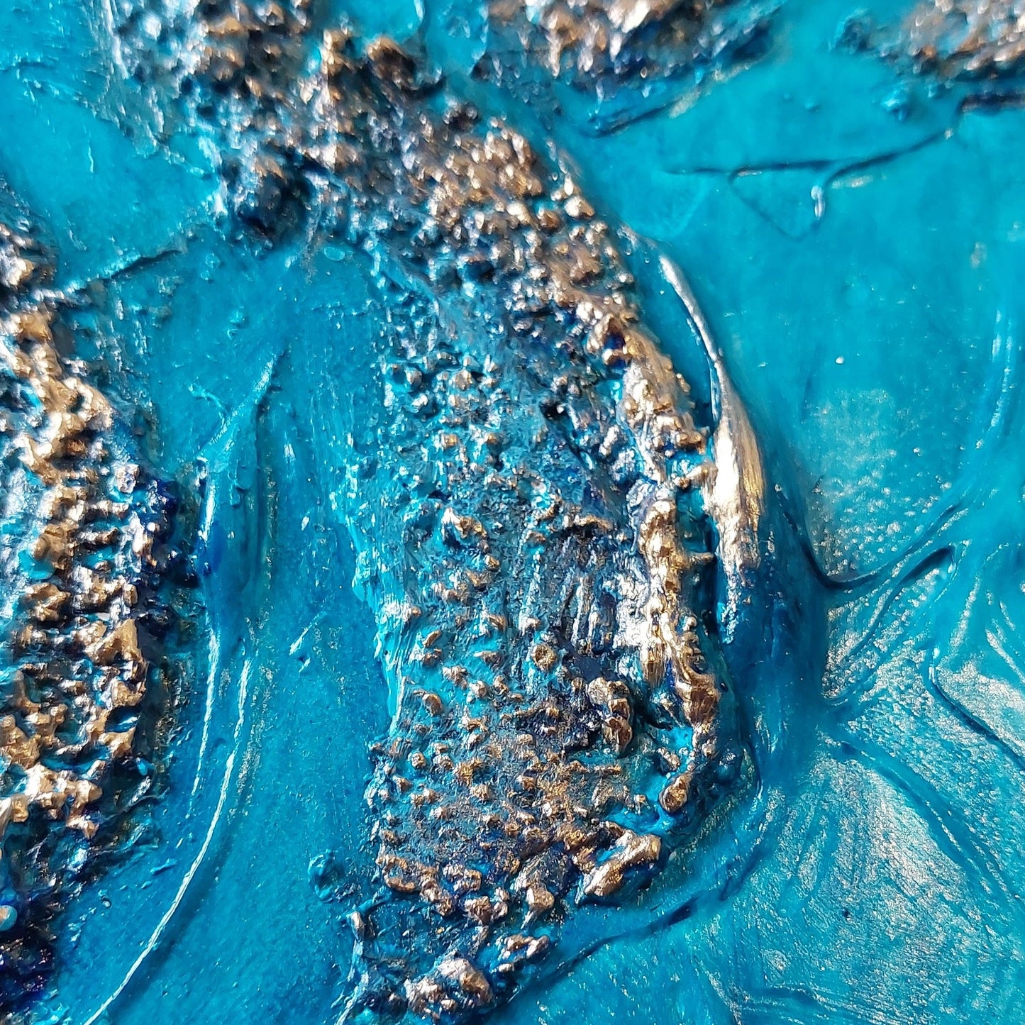 Heavily textured turquoise blue and gold canvas artwork