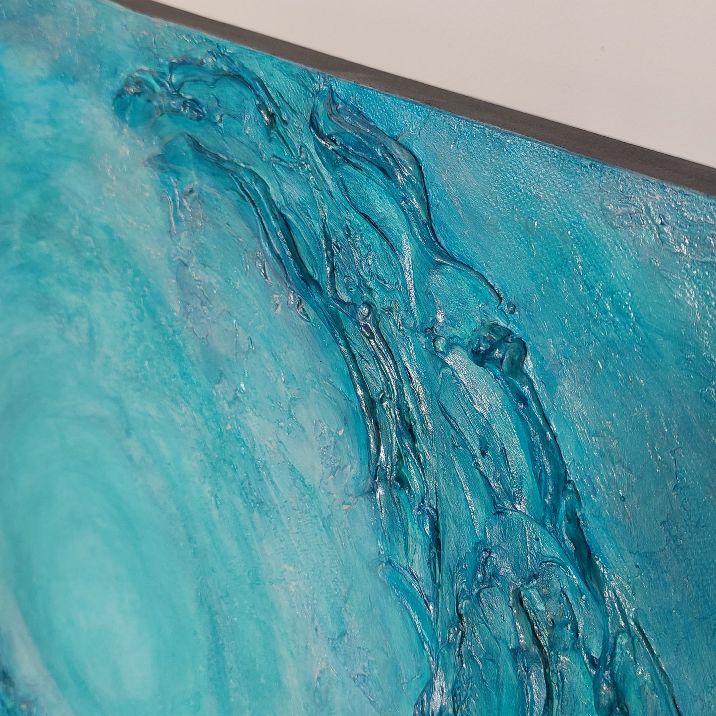 Close up detail Turquoise and blue seascape acrylic painting 