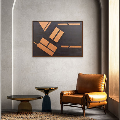 Copper and black canvas art hanging above mustard leather chair