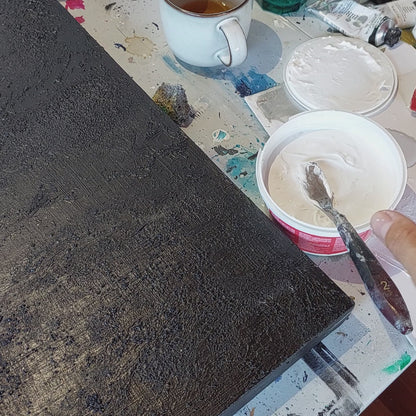 Video of texture being applied to a canvas painting