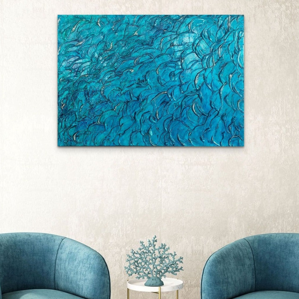 Heavily textured aqua blue painting on canvas